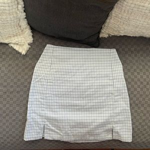 a cute older style of a brandy melville mini skirt